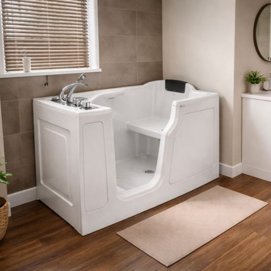 Moncks Corner SC walk-in tub in a modern bathroom with low step-in door, built-in seat, chrome fixtures, tiled accent wall and wood-look flooring for safe senior accessible soaking and bathing.